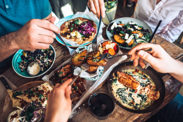 Happy people sharing their healthy lunch